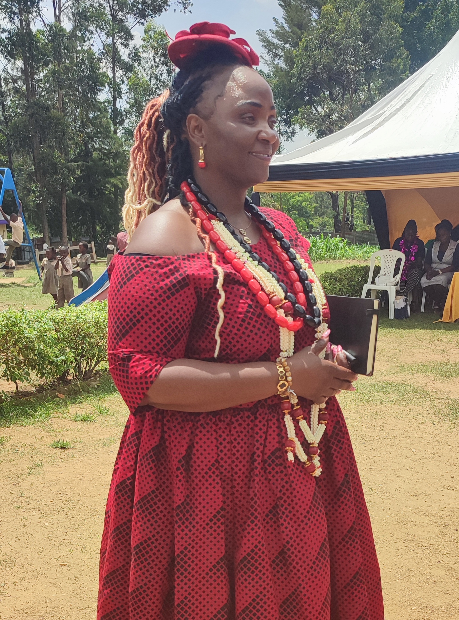 Director, madam Rose Makotsi celebrating graduands.